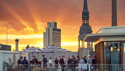 Event at sunset on the roof terrace of the Design Offices
