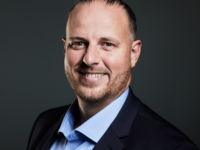 Portrait of Damian Mucko, Managing Director of Kuchem Conference Technology