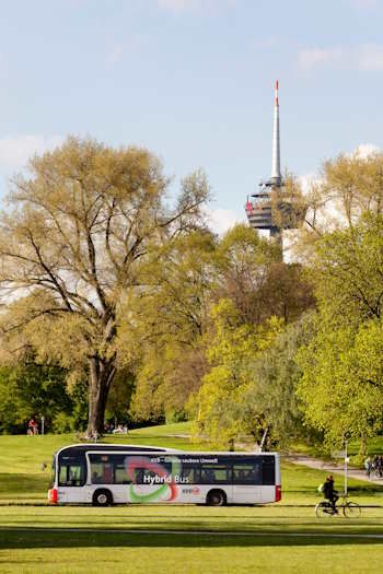 KVB bus drives through the green countryside